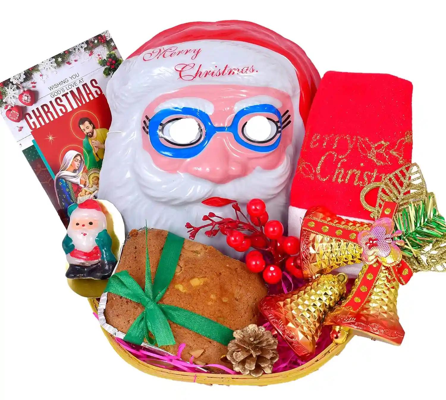 Christmas Gift Hamper/Christmas Cake Gift/Christmas Gifts-Decorated Basket+150gms Cake+Christmas Decorative Bell hangings+Santa Claus mask+Santa Claus Candle+Bunch of Decorative Cherry+Pine Cone