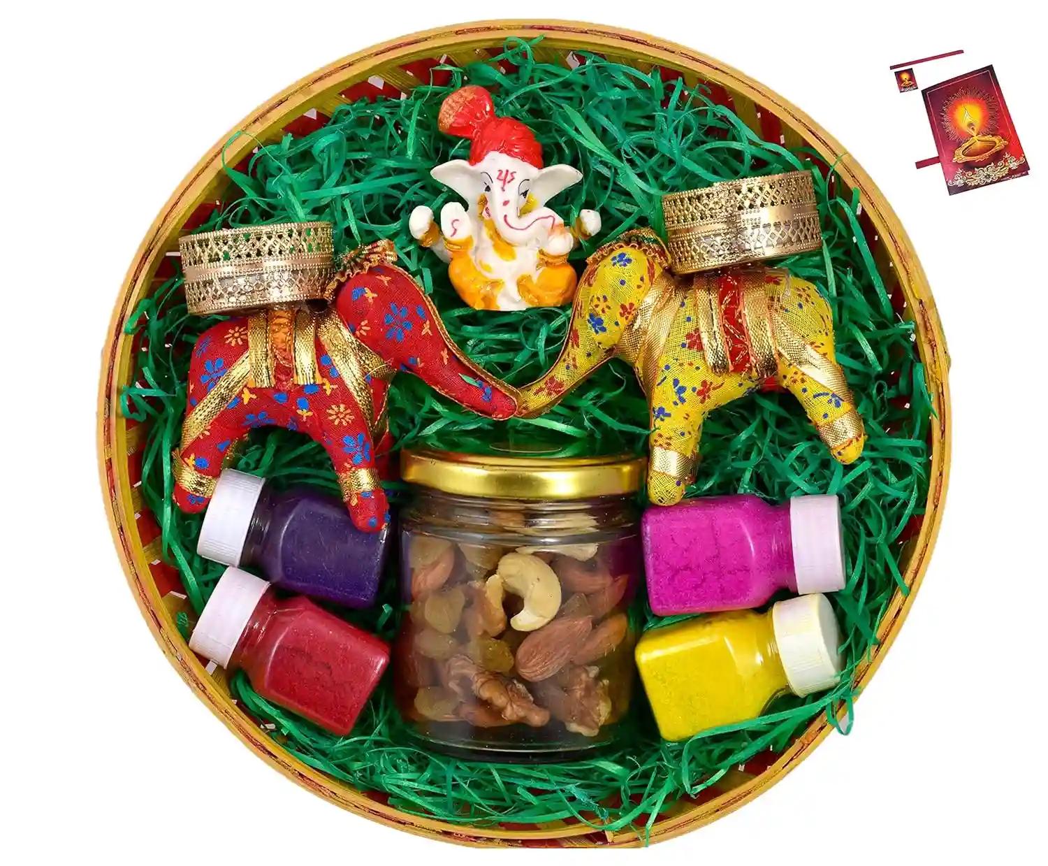 Diwali dry fruits/Diwali dry bruits gift box/Diwali dry fruits box-Decorated basket+60 gms of mix dry fruits in a glass jar+2 elephant candle stand with candles+showpiece figurine+rangoli colours+Card